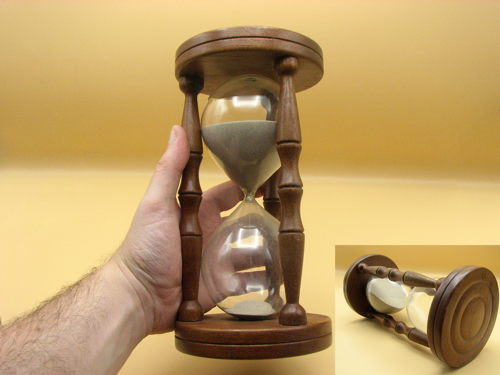 Large mid 20th century wooden sandtimer with turned pillars
